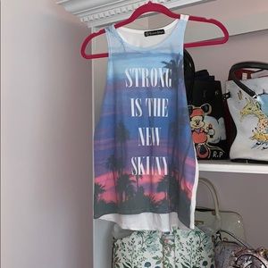 Strong is the new skinny tank top